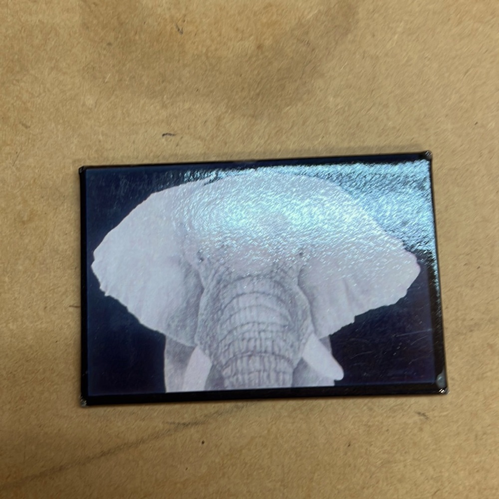 Custom designer magnet.  Image title:  Smoky